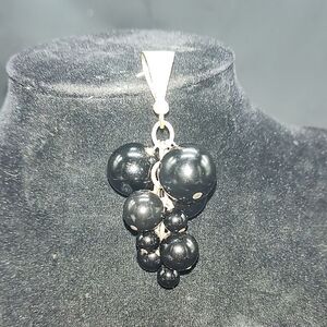 Sterling Silver And Onyx Graduated Spheres Pendant